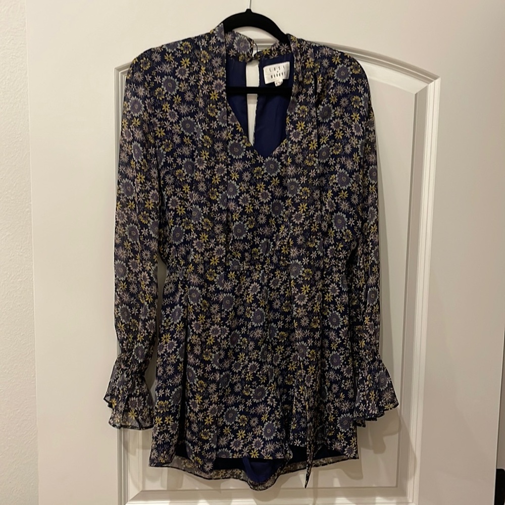 Purple floral romper.